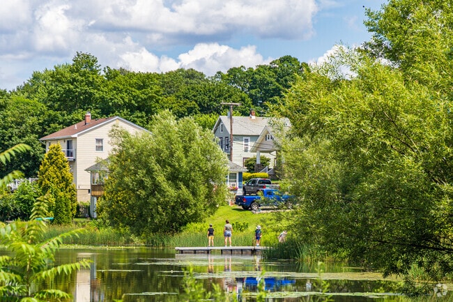 A golden sunset reflects off Lake Musconetcong in Netcong, casting a warm glow that captures the peaceful magic of lakeside living.