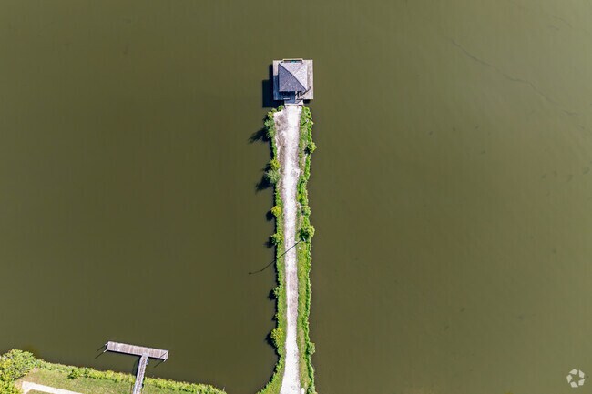 The dock at Sportsman Park is a popular spot to enjoy fishing with family & friends in Decatur.