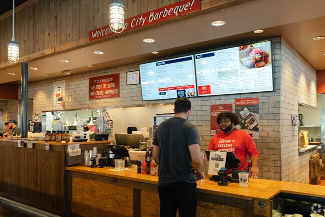 Dining options near North Riverside include City Barbeque at Abernathy Square, a local favorite known for its authentic slow-smoked meats.