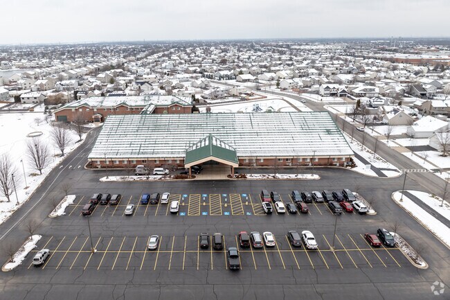 Trinity Christian School has a large parking lot.