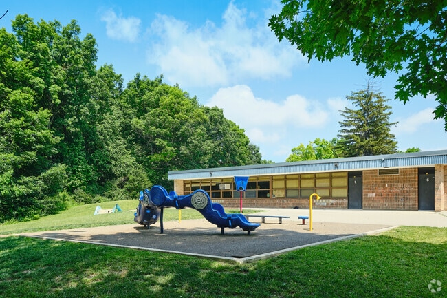 Abbot Elementary has a smaller playground at the front of the school.