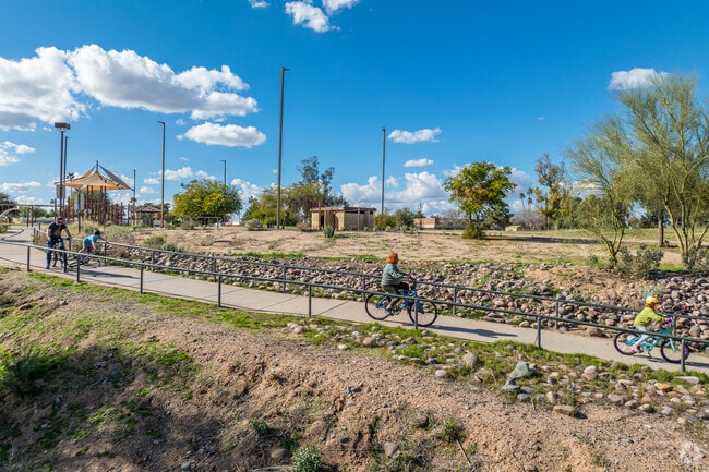 Family bike ride through Cave Creek Park in North Mountain Village.