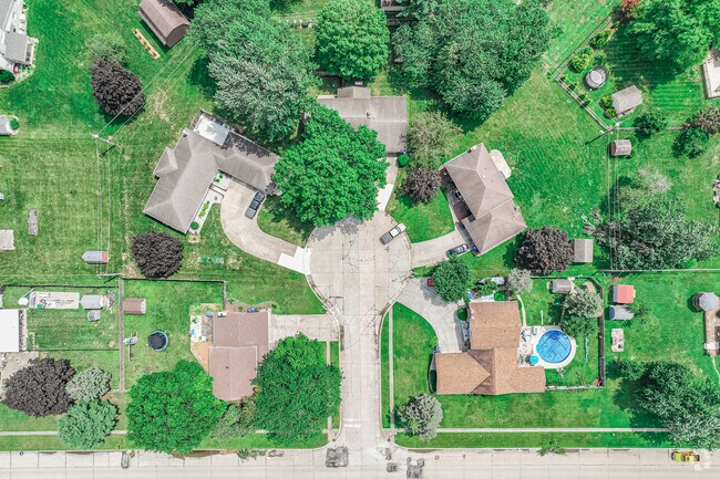 Westbrook homes East of Berkley showcase mature trees and tidy lots.