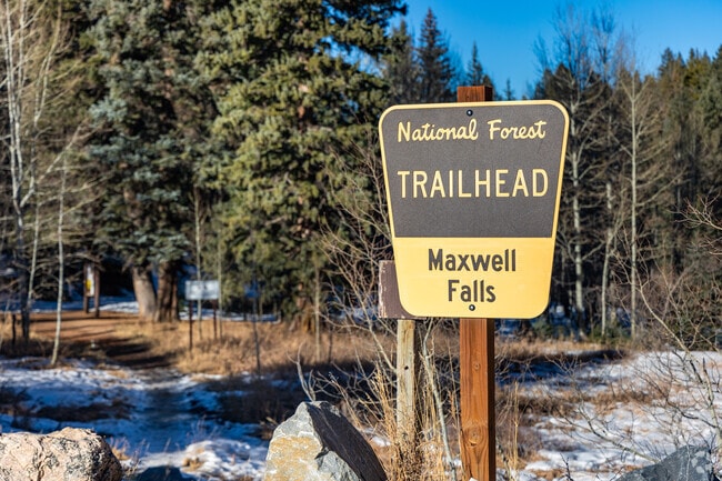 The Maxwell Falls trailhead winds through the nearby forestry in Conifer.