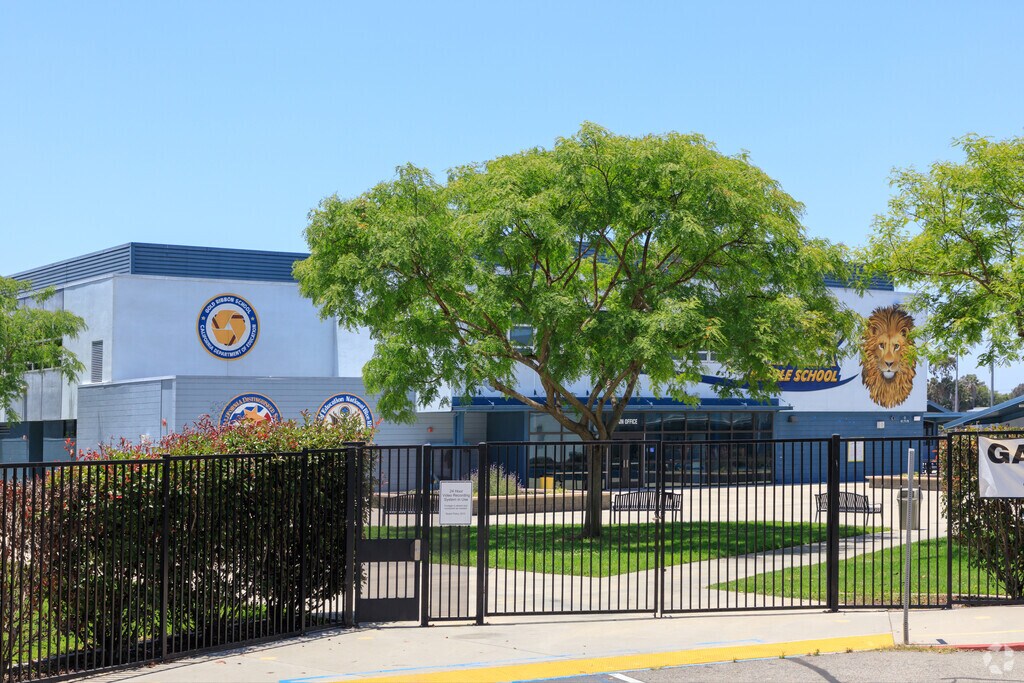 A front gate at Oak Middle School in Los Alamitos helps provide a secure campus to its students.