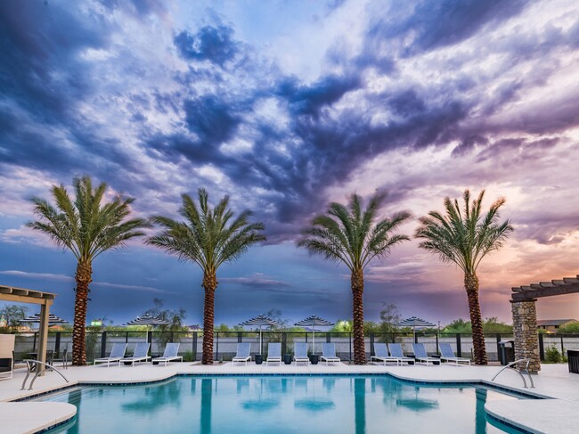 Escape the heat in style! Our resort-style pool with a covered pergola is your new favorite summer spot.