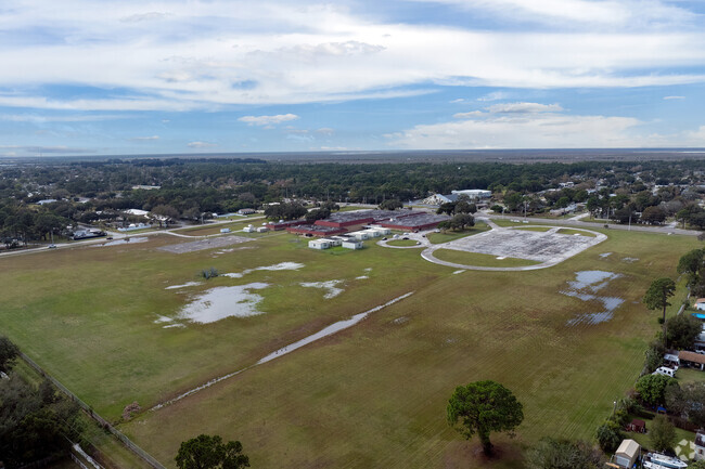 At John F. Kennedy Middle School, a very ;arge green space provides an area to run around.