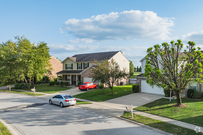 Popular Grove features a mix of mid-century ranches and brick-and-vinyl siding homes.
