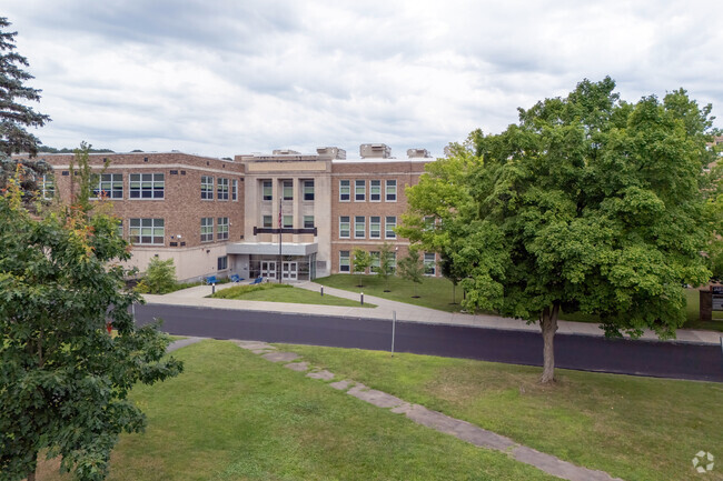 A renovated building that has a classical entrance, Gregory B. Jarvis Middle School endures.