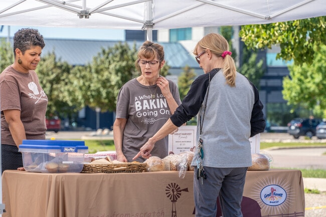 Support local farmers and artisans at West Acres Farmers Market.