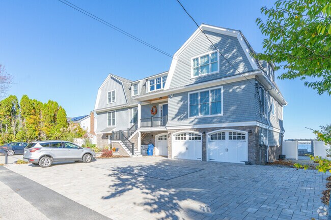 Beach homes in Potowomut have the first floor raised to allow flood waters to pass underneath.