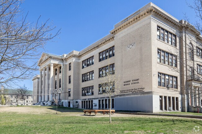 Gilbert Stuart Middle School anchors the West End with its historic design.