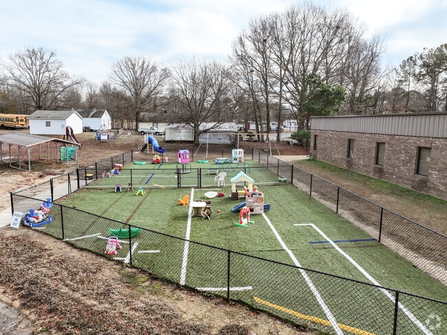 Kids at Faith Christian Academy in Kannapolis have a blast in the play area.