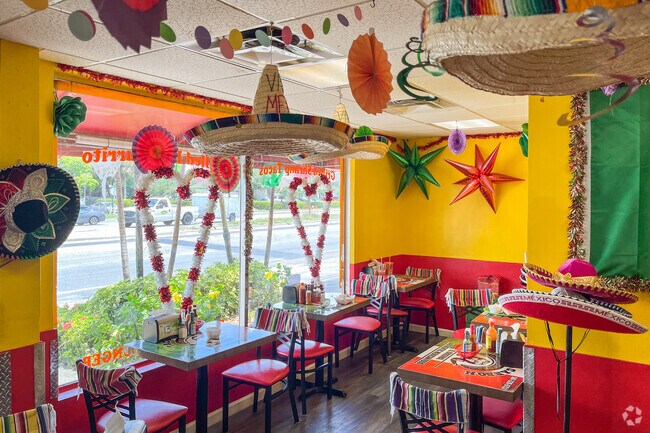Tacos Al Carbon welcomes diners with an authentic atmosphere.