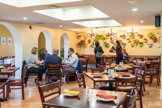 Neighbors meet to enjoy the delicious food at La Casona Restaurante in Hutchinson Mills.