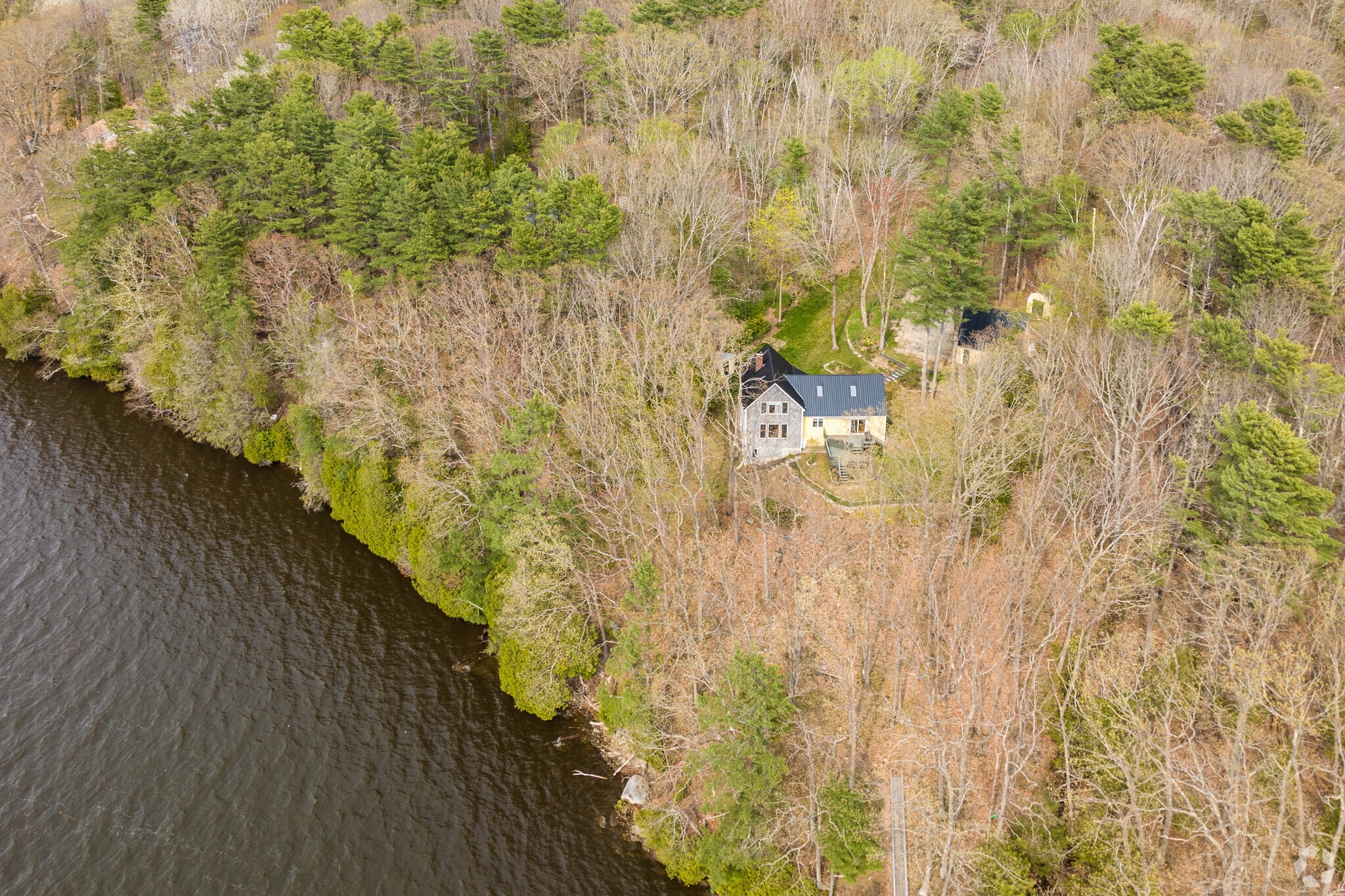Aerial view of a home along the Kennebec River in Arrowsic, Maine.