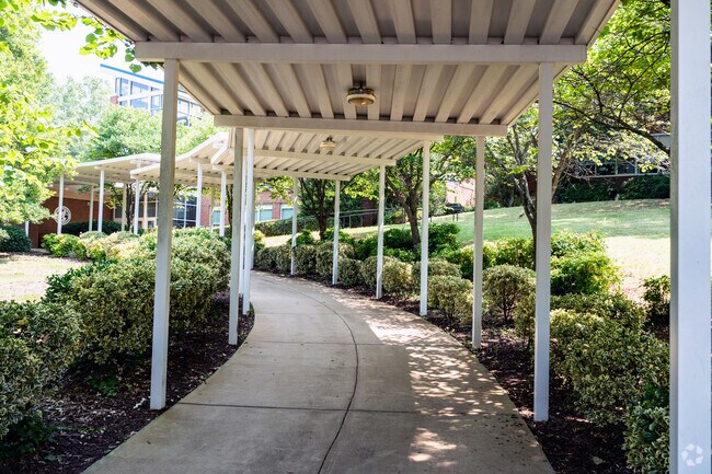 A covered walkway greets visitors at the entrance to Oberlin Middle School.