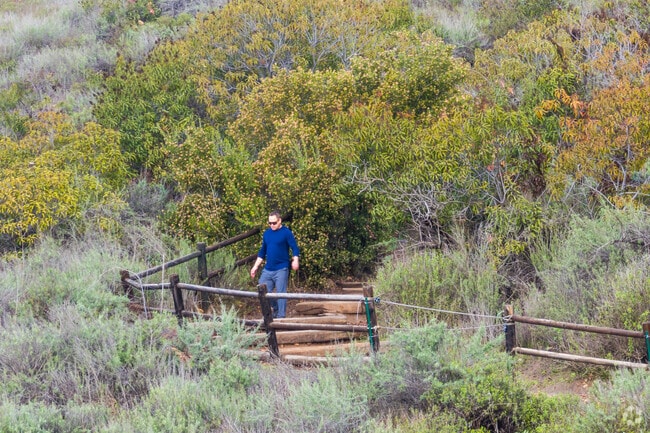 A hikers makes his way down Cowles Mountain in San Carlos.