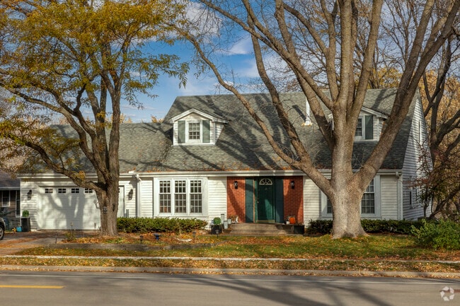 Cape Cod allure near top-tier schools, pristine trails, and Creek Valley's open space.