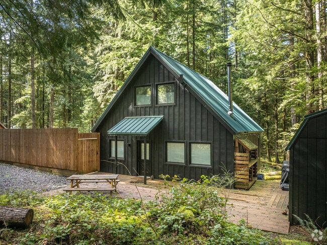 Chalet style homes can be found in densely wooded parts of East Sandy River Area.