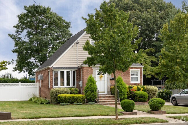 Quaint small cape cod style homes line the streets of New Hyde Park.