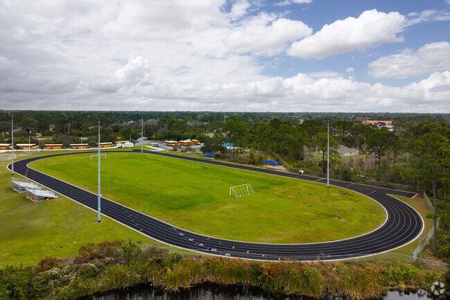 Odyssey Prep Academy features a large track and field for students.