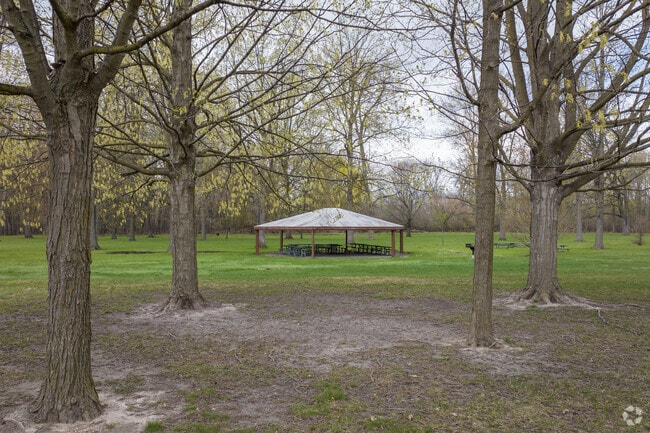 Picnic gazebo in the center of Washington Park wooded green space in Greencroft Park