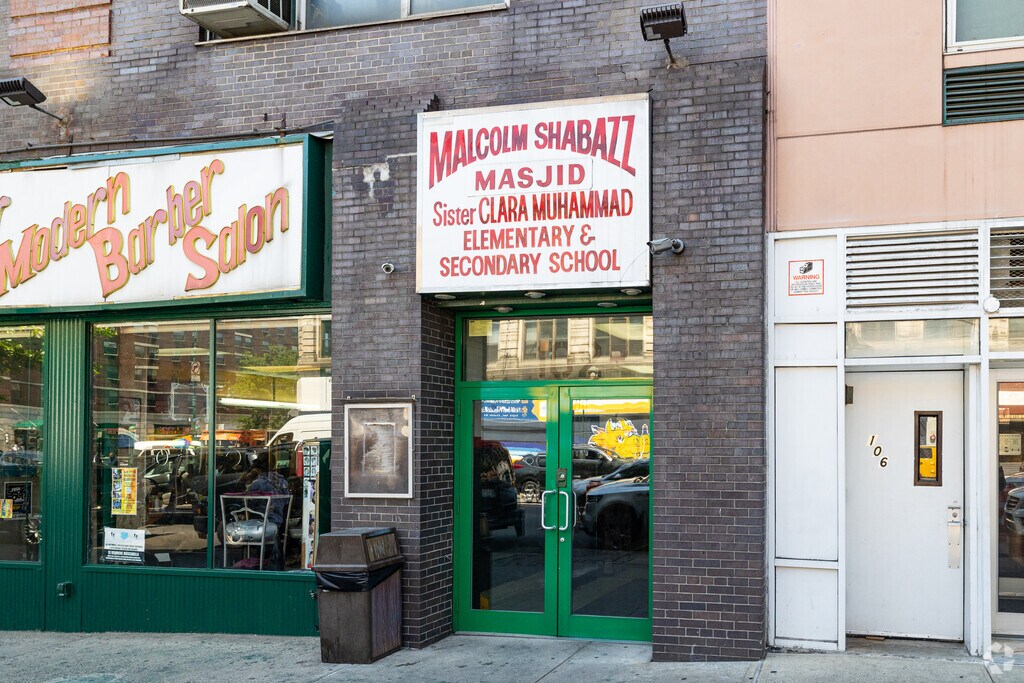 The Clara Mohammed School Elementary and Secondary School sits along a retail strip in Harlem, New York.