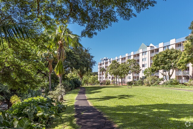 A walking path in Liliʻuokalani Botanical Garden gives Honolulu residents space to enjoy nature.