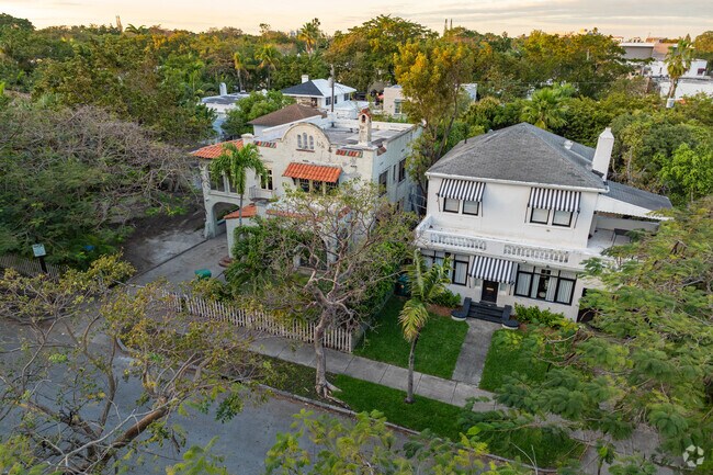 An elevated tranquility envelops a row of Mediterranean-style homes in the Miami Design District.