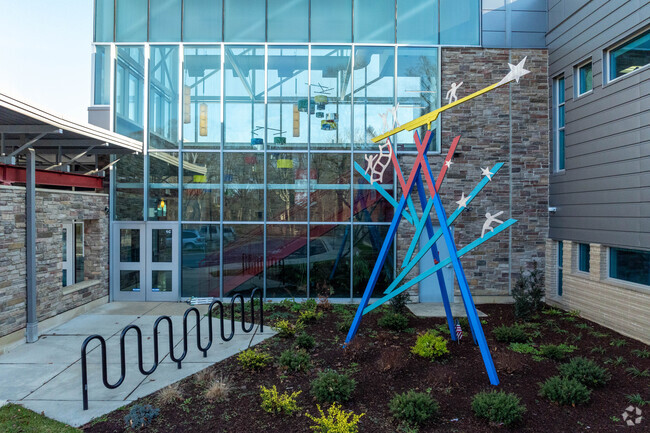 A fun sculpture welcomes students to Cooke Elementary School.