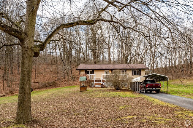 A ranch-style home nestled in Jefferson Township’s woods offers privacy and rural living.
