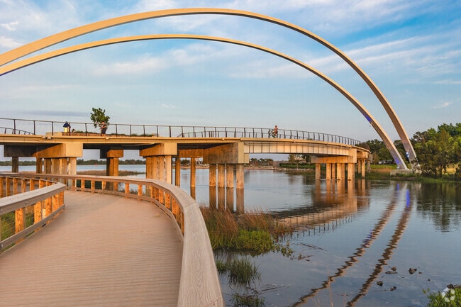 Noisette Creek Bridge at sunset is the best spot for strolls and wheelies in Charleston Heights.