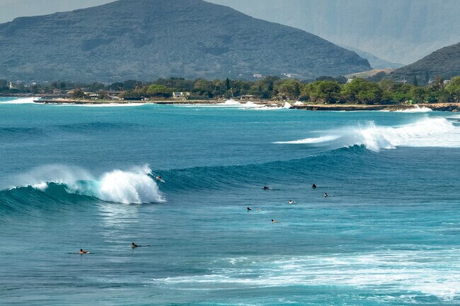 Surfers have no shortage of barreling waves at Tracks Beach in Nanakuli.