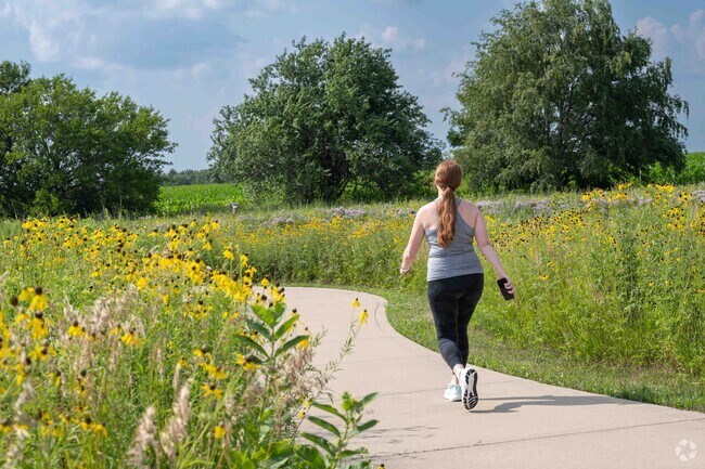 Sunset Ridge Park in Boulder Ridge has a nice walking path with a restored prairie area.
