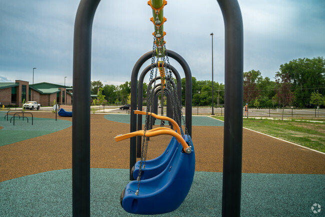 The swing set at Carmel Elementary School in Downtown Carmel has inclusive swing seats.