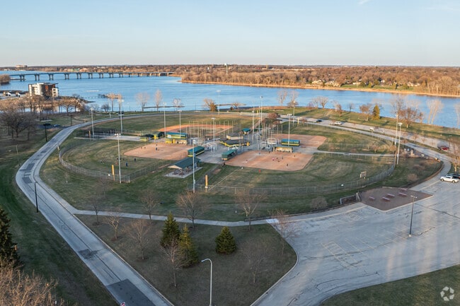 Ashwaubomay Memorial River Park offers trails, river access, a beach, and picnic facilities.