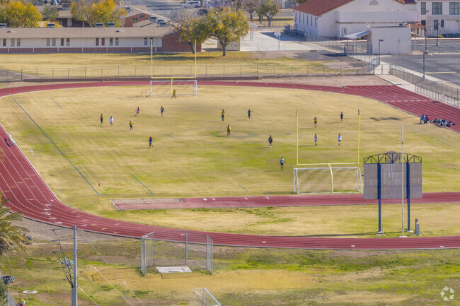 Students practice football at Coolidge High School.