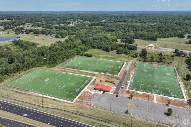 Outdoor fun awaits at James S. Long Regional Park near Hickory Grove with fields and courts.