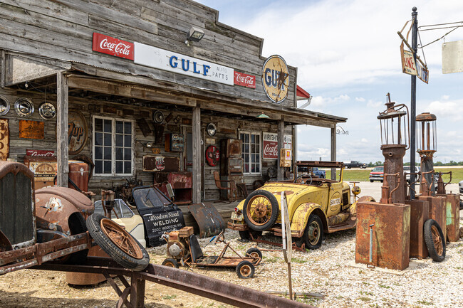 The Route 66 Museum displays a collection of antique cars and memorabilia.