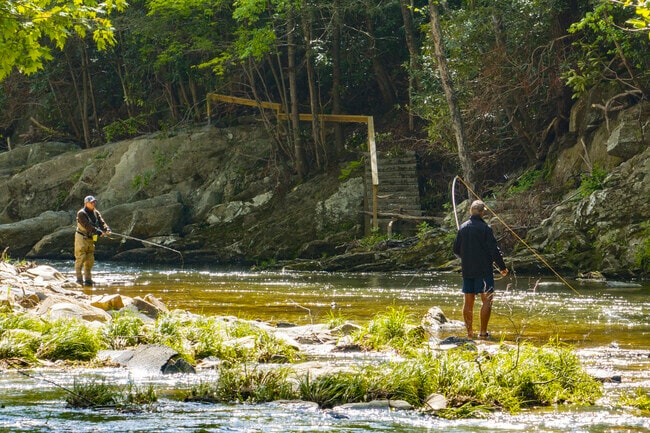Vilas locals enjoy the incredible summer weather and the variety of outdoor activities surrounding the area, like fly fishing on the Watauga River.