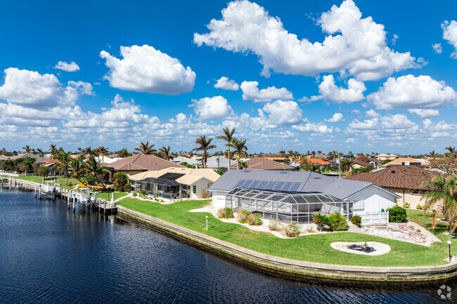 Homes in Burnt Store Isles offer private backyard swimming pools and canal access.