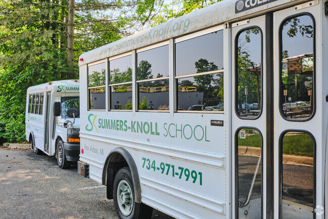 Summers-Knoll School has multiple busses for field trips with students.
