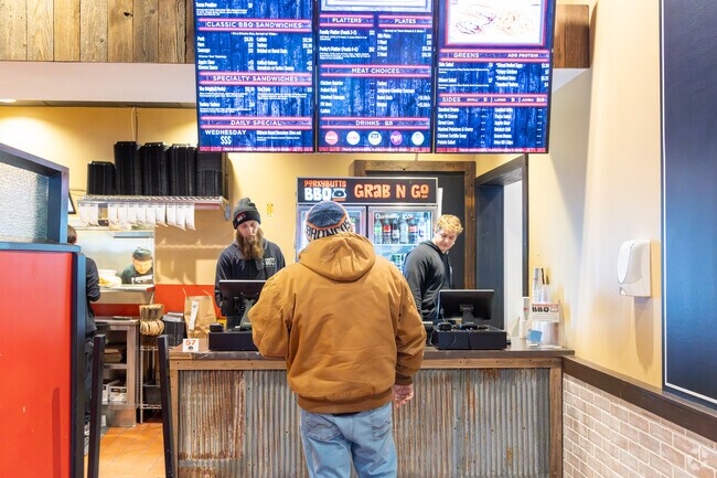 Porky Butts BBQ is your go-to spot for great food and good vibes near Champions Run.