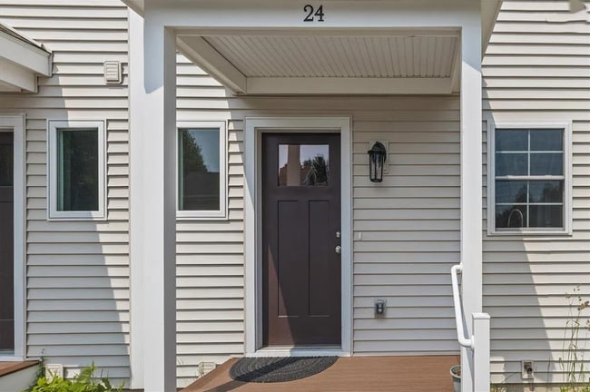 This is your new front door with a small porch for plants.