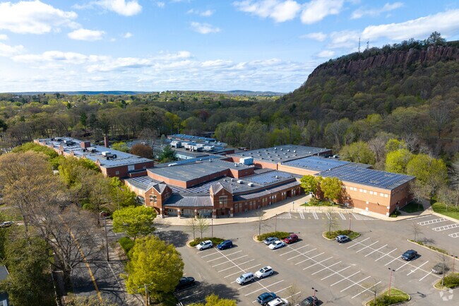 Students then move on to Wilbur Cross High School, which earns a B-minus score on Niche.