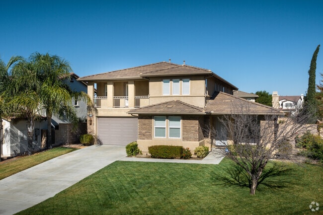 A beautiful green lawn is seen in front of a home in Wolf Creek.