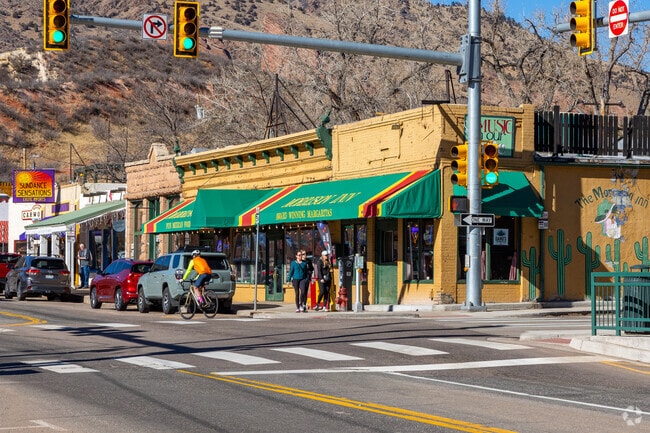 Restaurants, boutiques, and bars line Bear Creek Avenue in downtown Morrison.