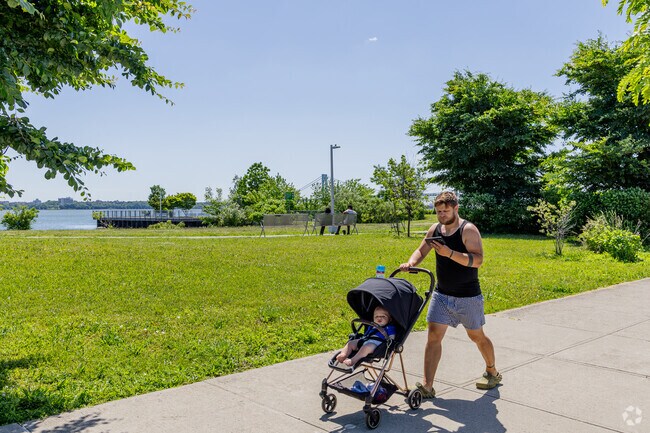 Stapleton's Waterfront Esplanade is a modern development with NYC harbor views and greenery.