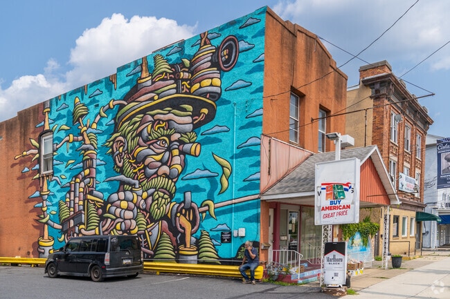 Colorful murals adorn historic brick buildings in the business district of Catasauqua.